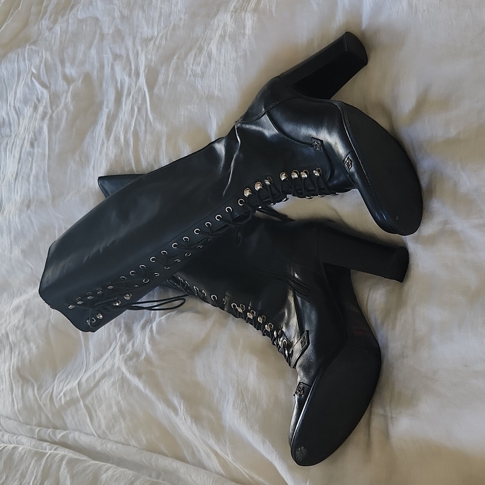 Knee high lace up boots